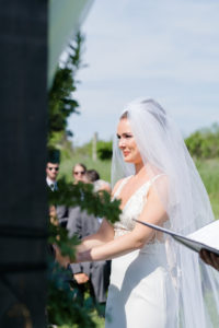 brides reaction to groom during ceremony