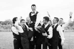 black and white of all the groomsmen
